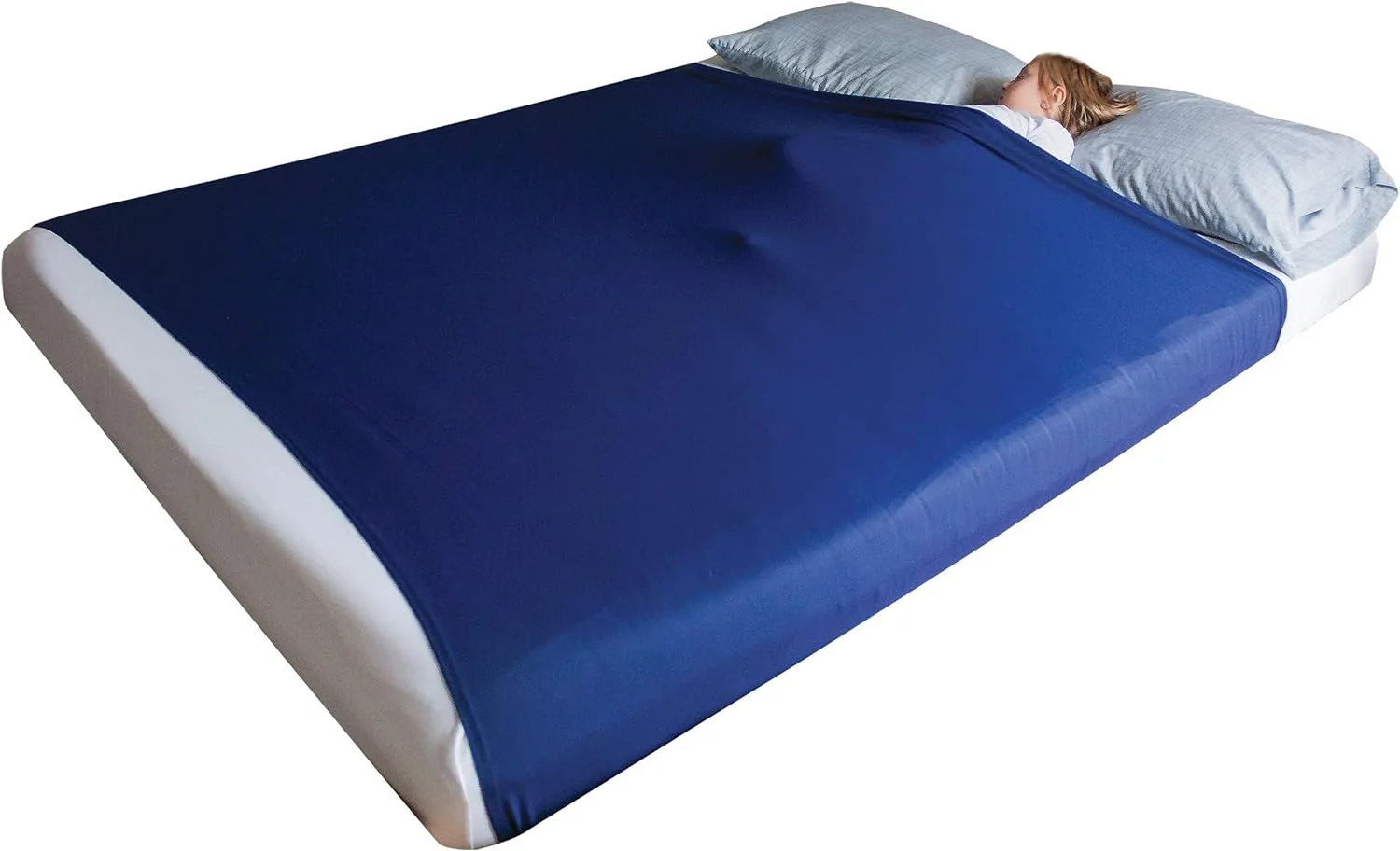 Kid sleeping on a white mattress and covered with blue compression sheet