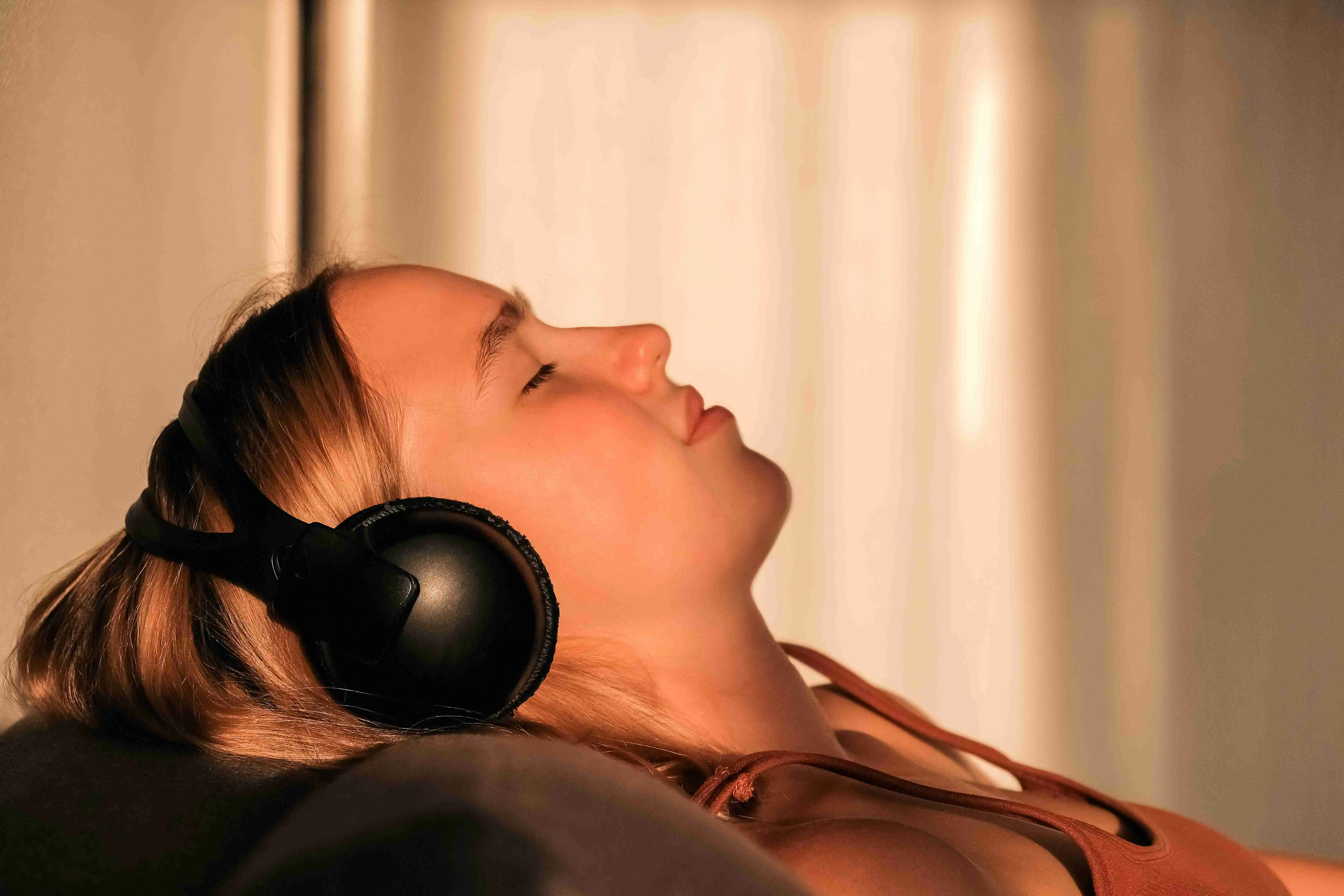 a relaxed woman meditates and breathes