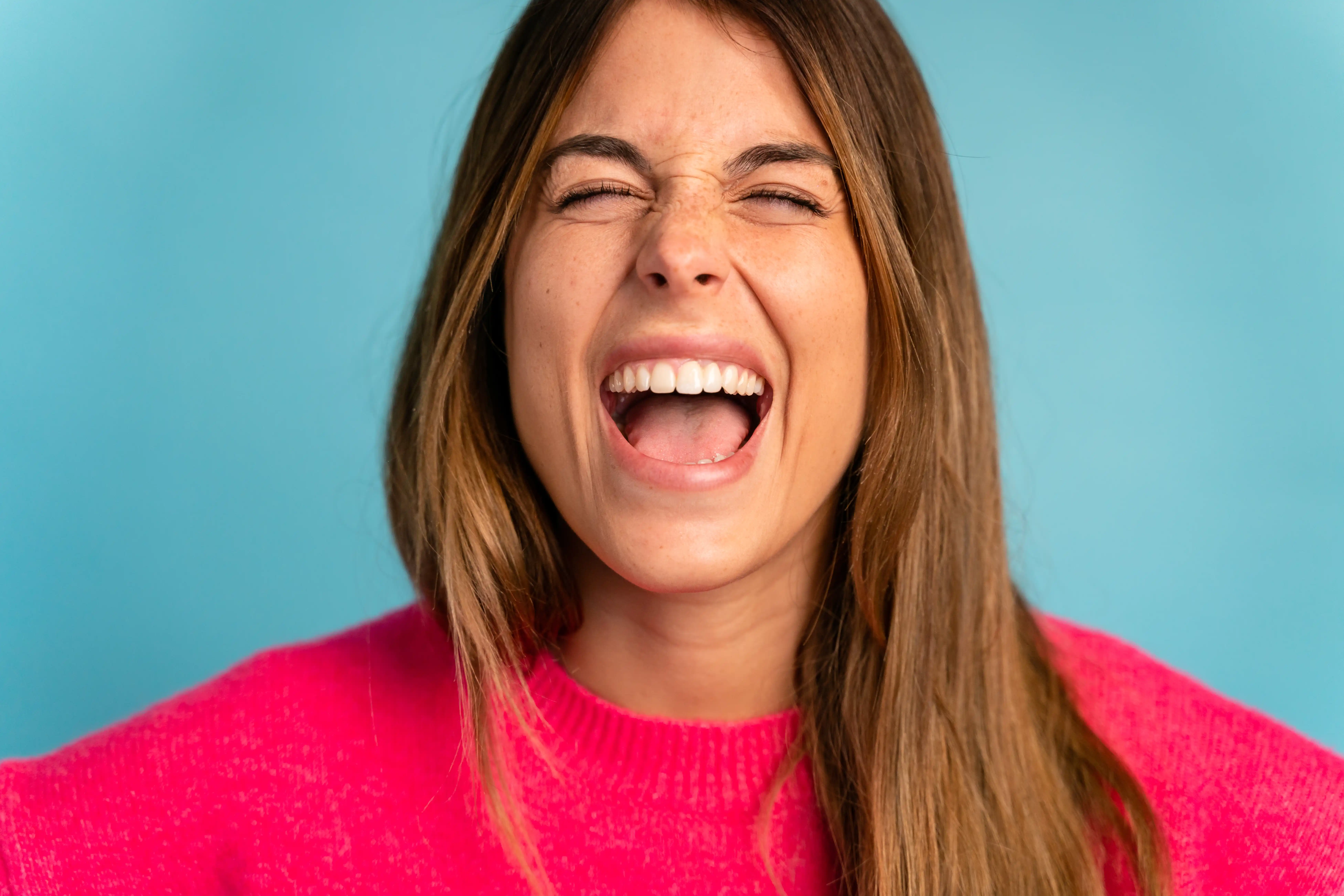 Happy woman with closed eyes