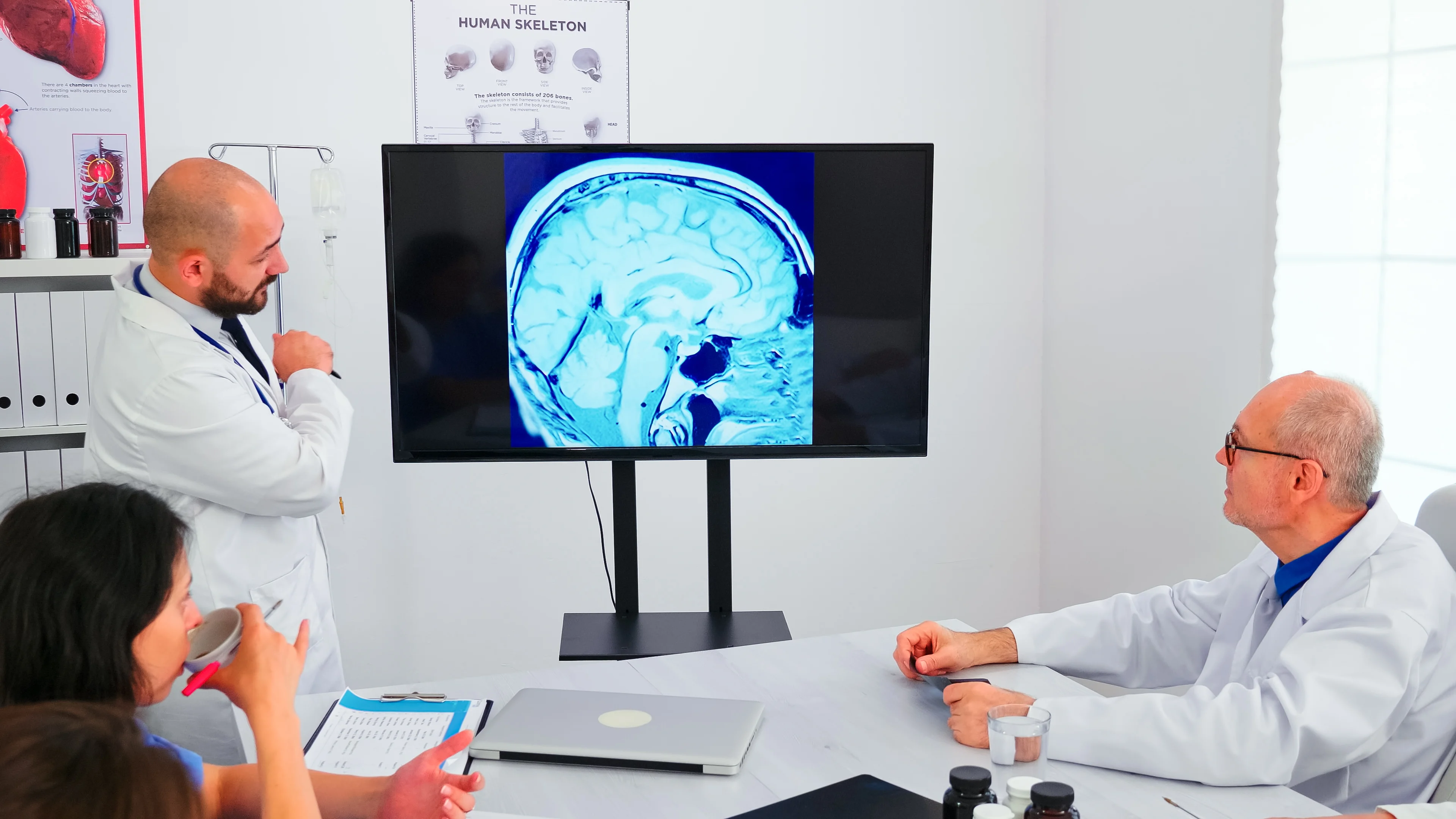 Expert doctor using modern technology during medical conference