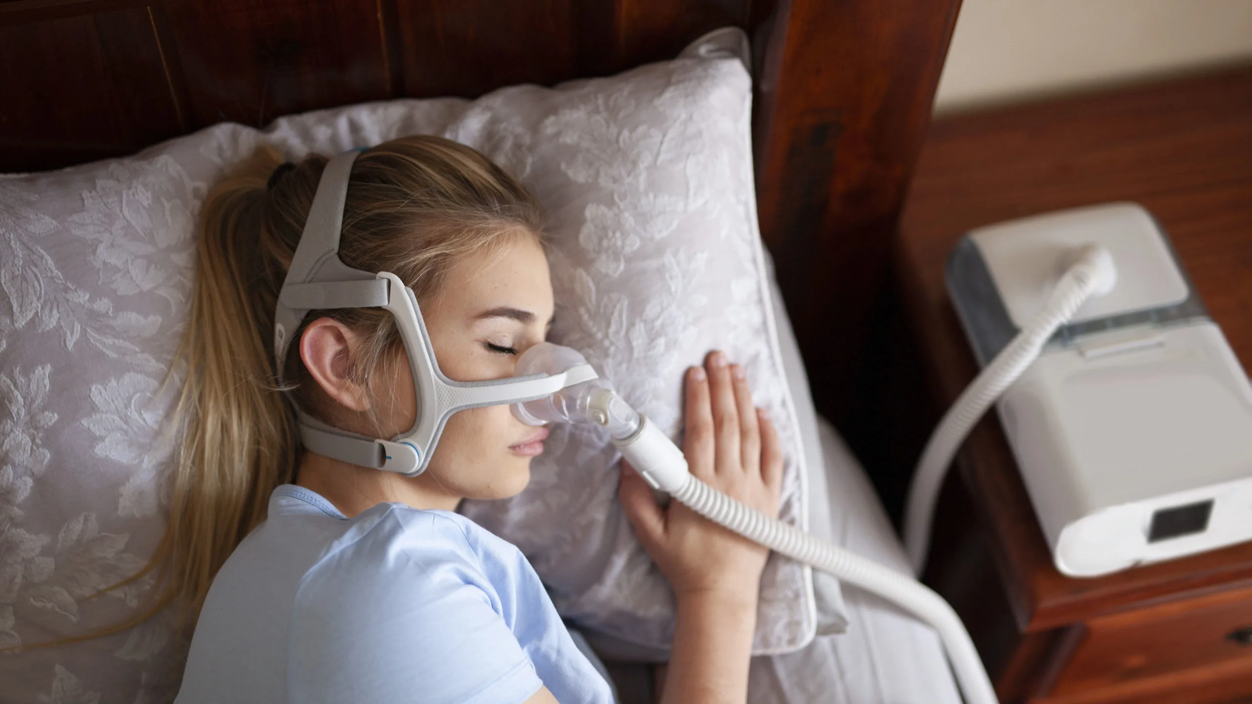 person sleeping with a CPAP