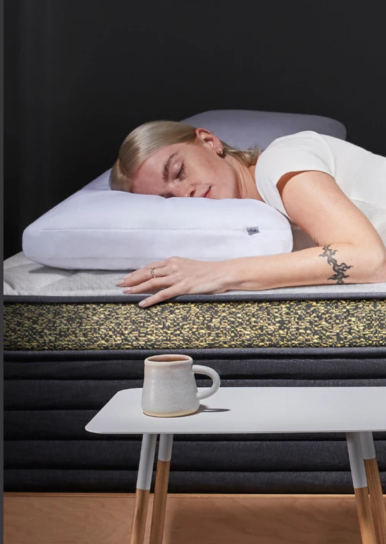 reviewer side sleeping on Helix Dawn Luxe mattress