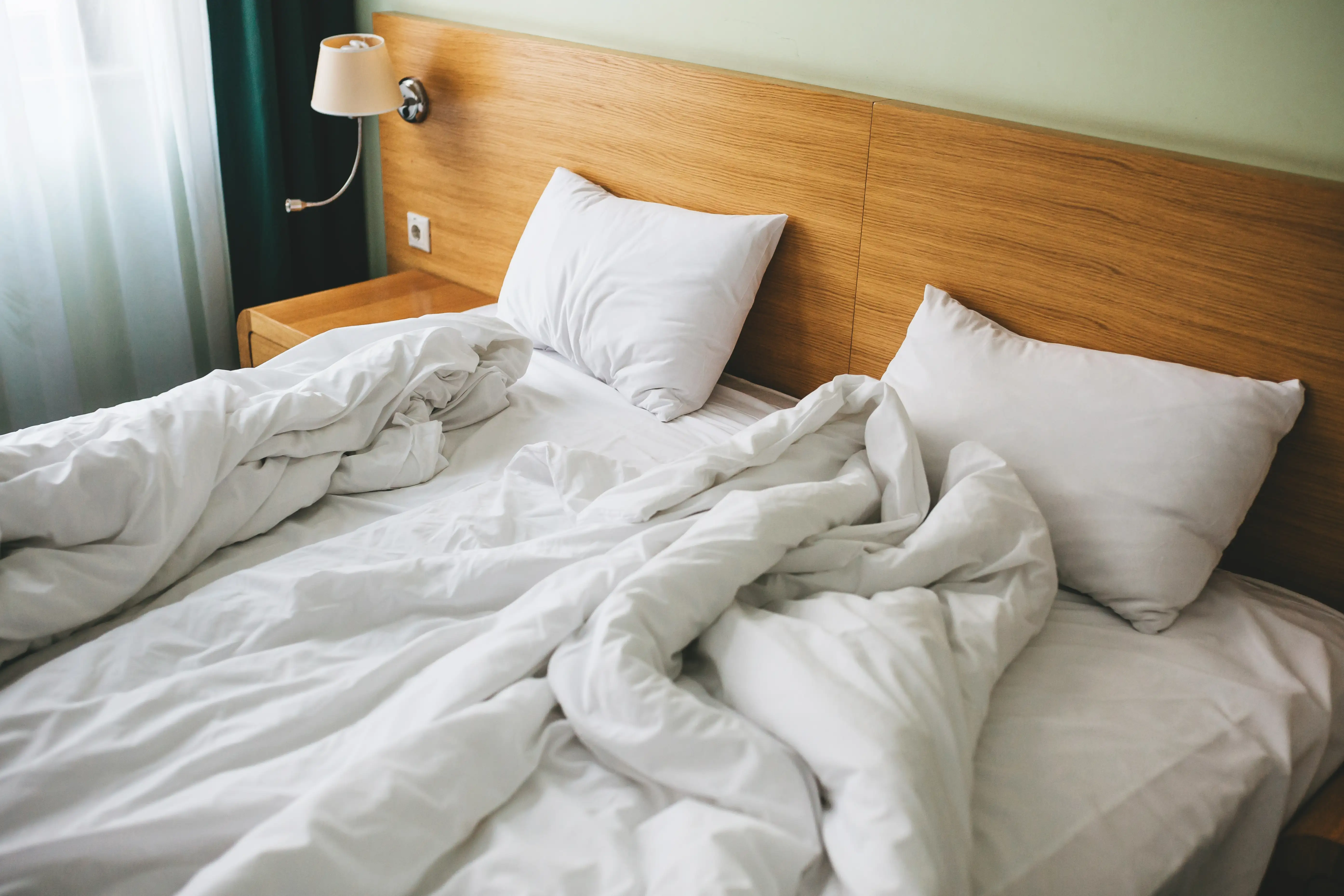 An empty bed in a hotel or apartment