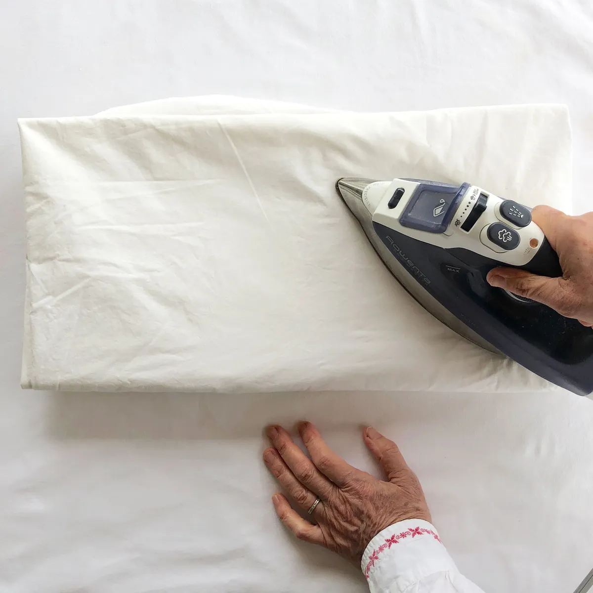 ironing a mattress sheet