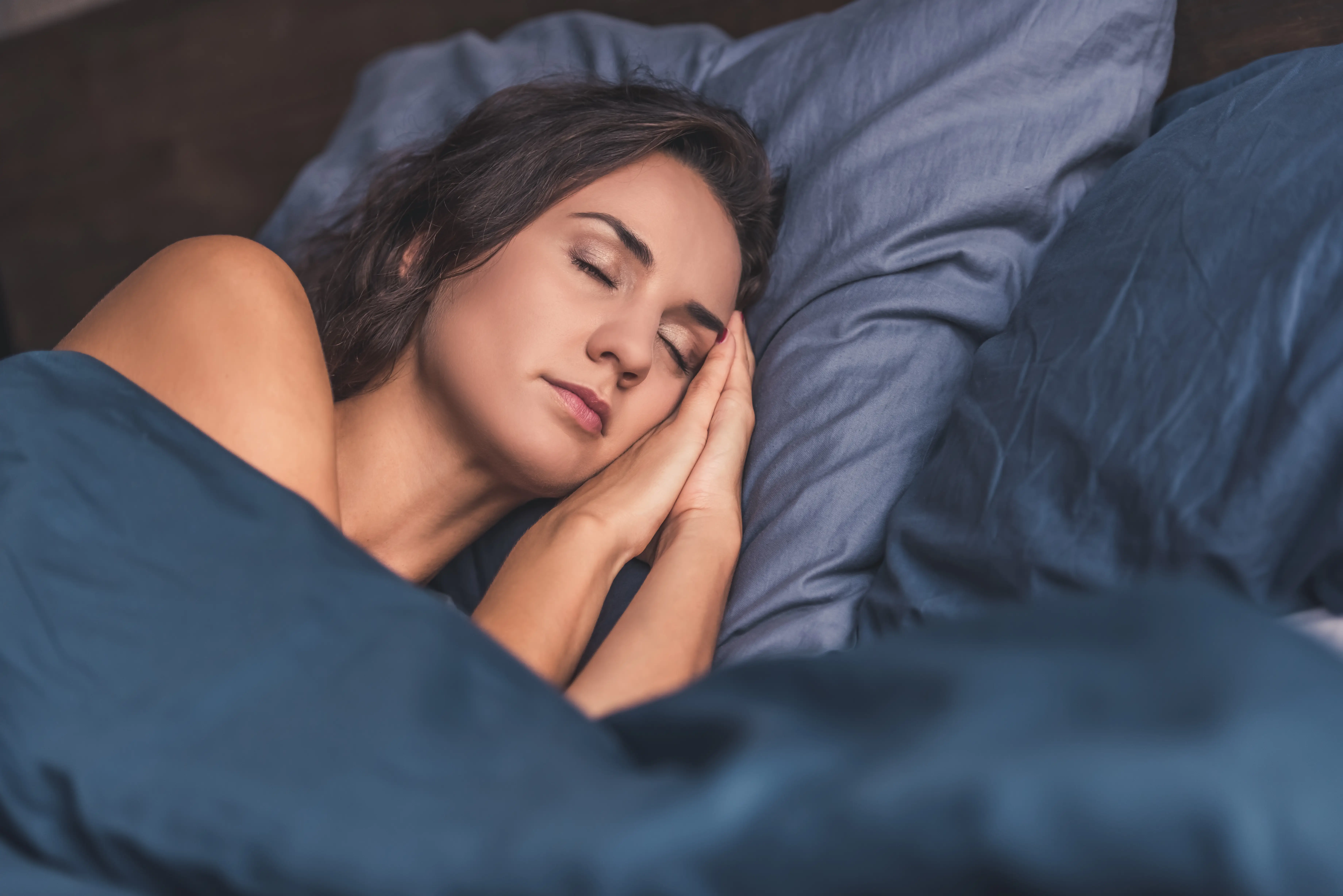 Woman sleeping in bed