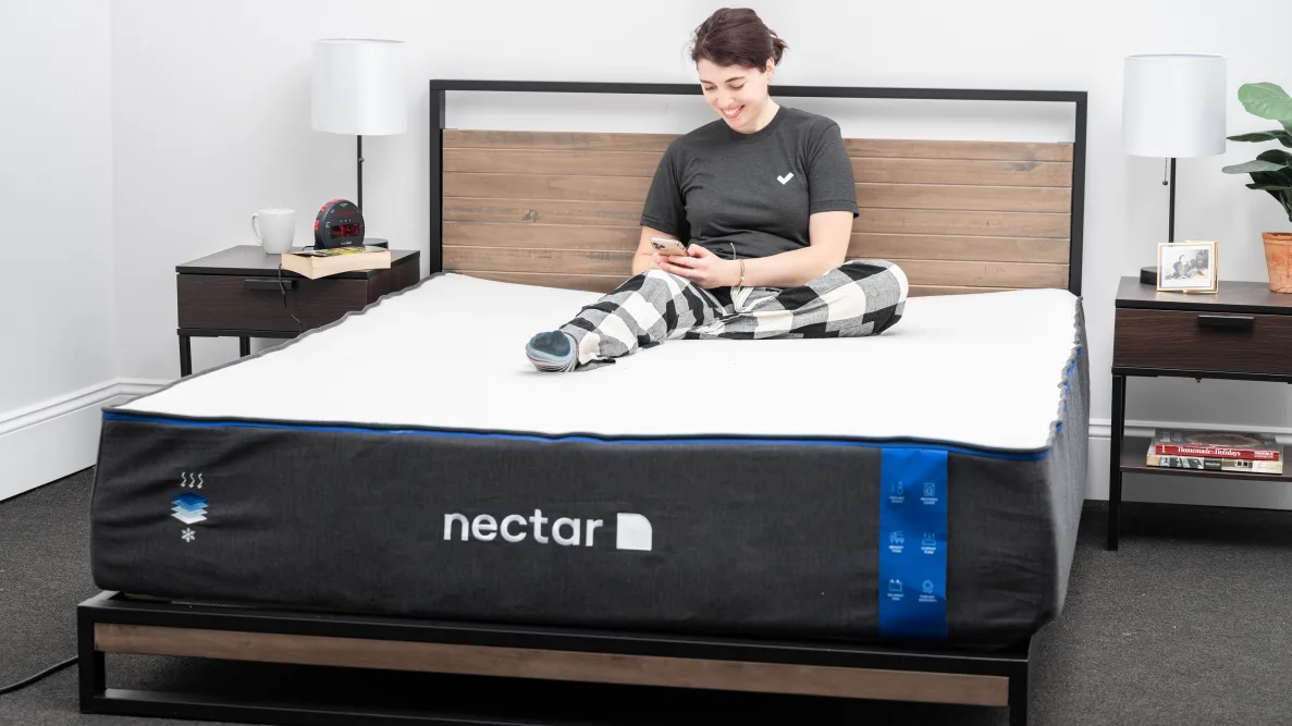 A woman laying on Nectar Memory Foam Mattress