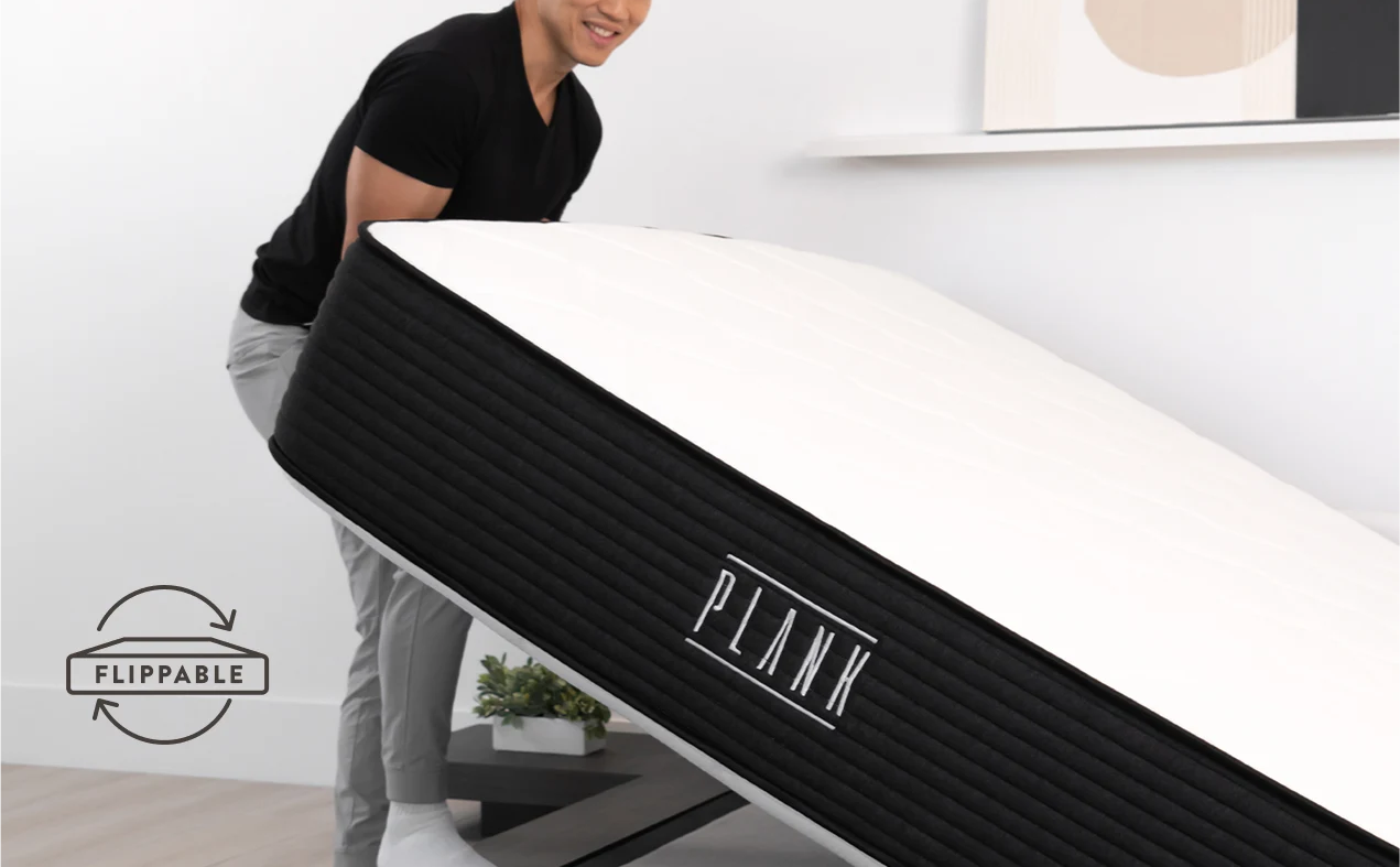 A reviewer un-boxing plank firm luxe