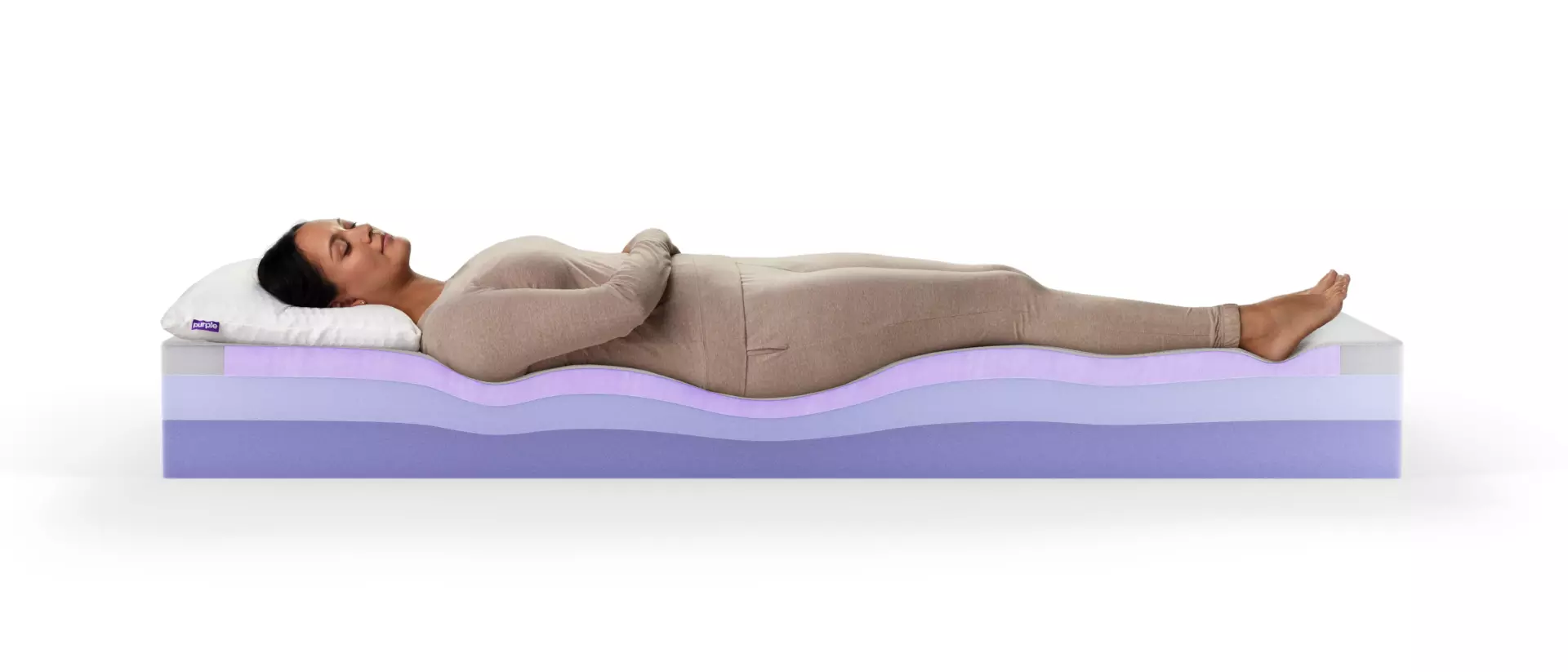 reviewer sleeping on Purple mattress