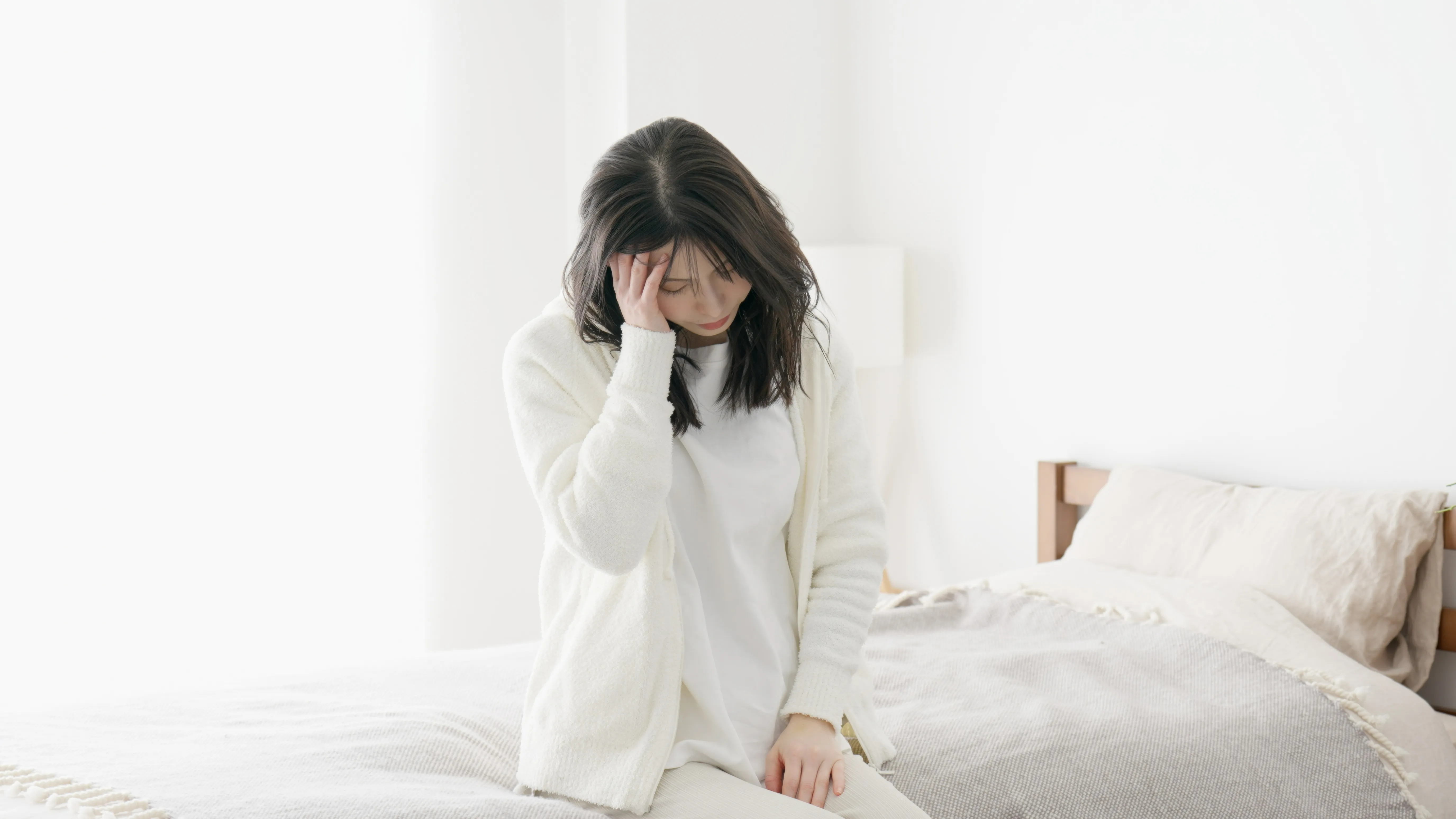 A woman who is not feeling well