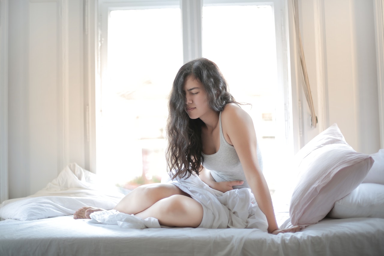 woman using too mush oregano oil