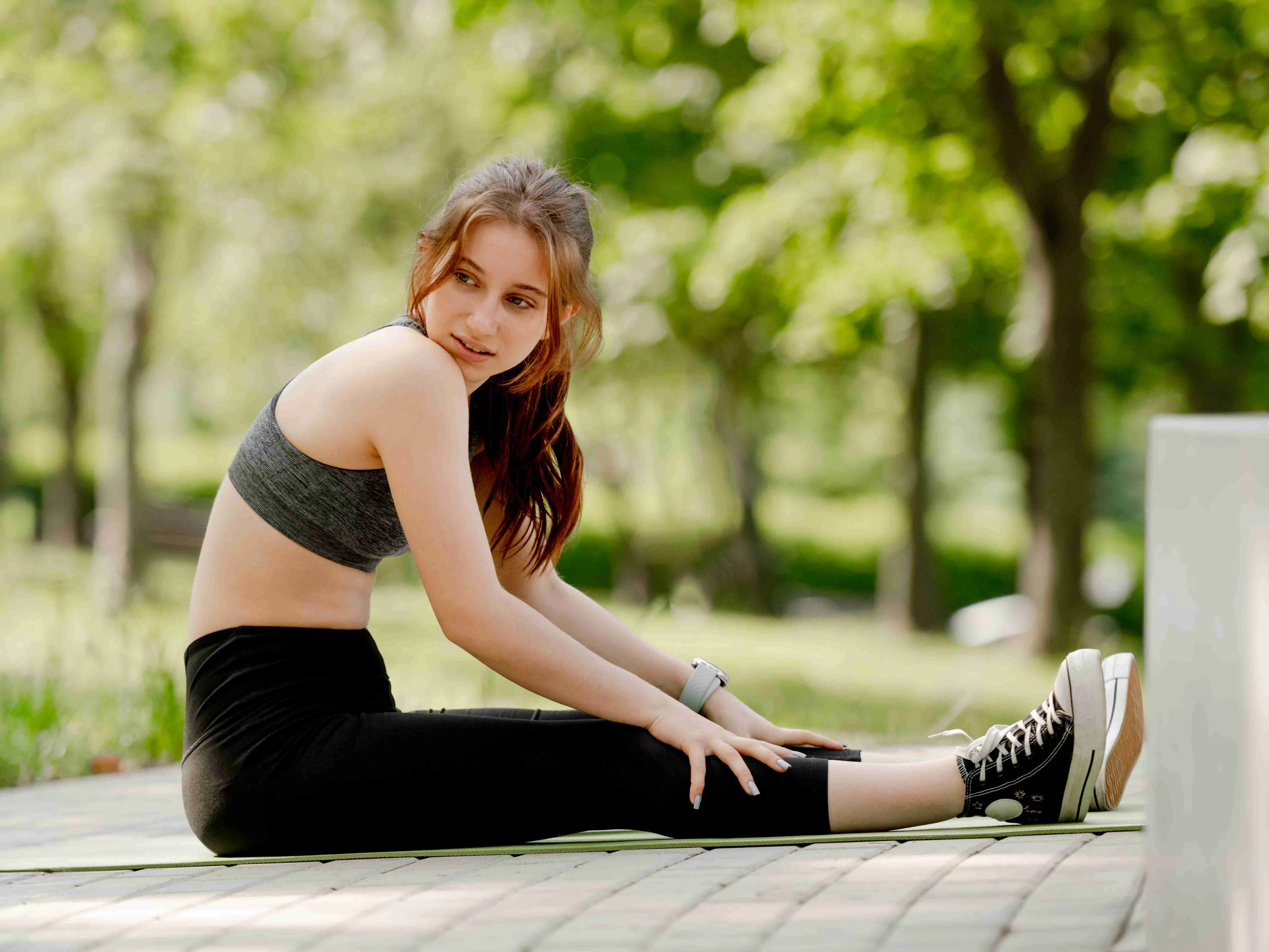 Teenage Girl Poses In Sportswear