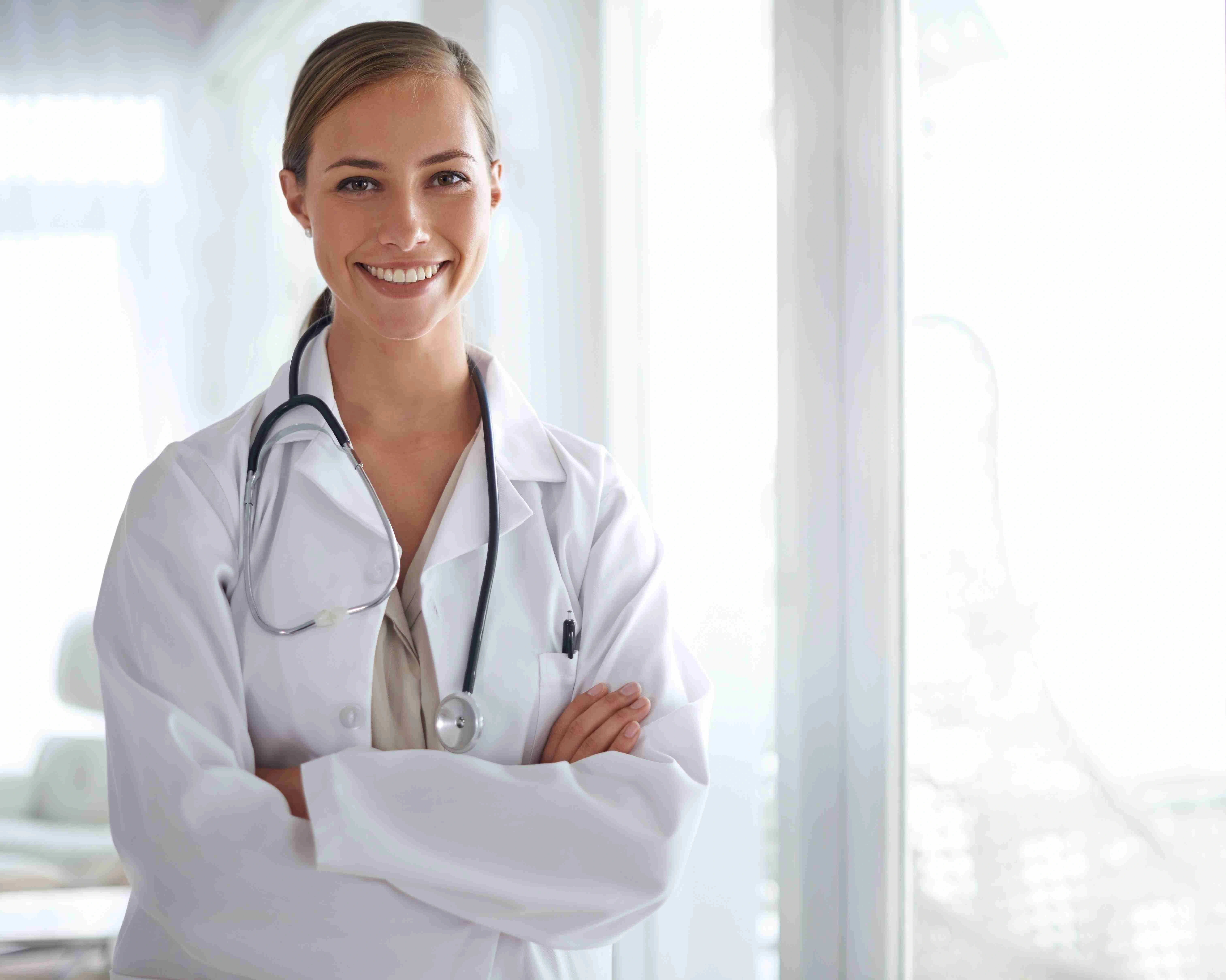 Portrait of an attractive young doctor standing with her arms folded