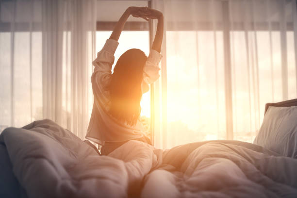 woman waking up in bed